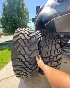 Side-by-side comparison of Toyo Open Country M/T (left) and Kenda Klever M/T (right) showing tread pattern differences for off-road traction and durability.