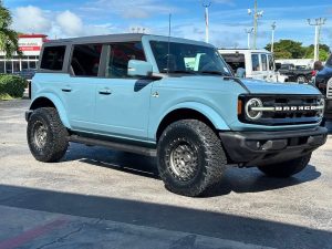 Ford Bronco equipped with Nitto Recon Grappler all-terrain tires, showing balanced tread design for daily driving and off-road traction.
