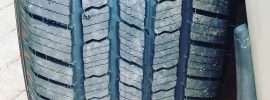 Close-up tread view of the Michelin Defender LTX M/S2 tire, highlighting its highway-focused pattern built for longevity, smooth ride quality, and year-round traction on ½-ton trucks.